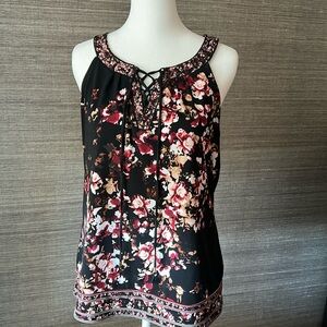 White House Black Market floral tank with laced up V at neck line.  Size small